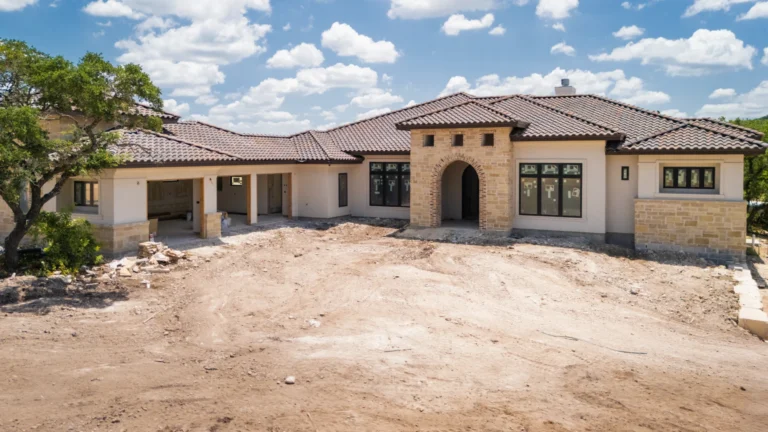 Exterior photo of a custom modern tuscan estate by Genesis Custom Homes in Pecan Springs, Boerne, TX
