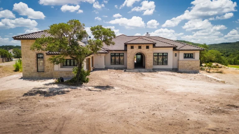 Exterior photo of a custom modern tuscan estate by Genesis Custom Homes in Pecan Springs, Boerne, TX