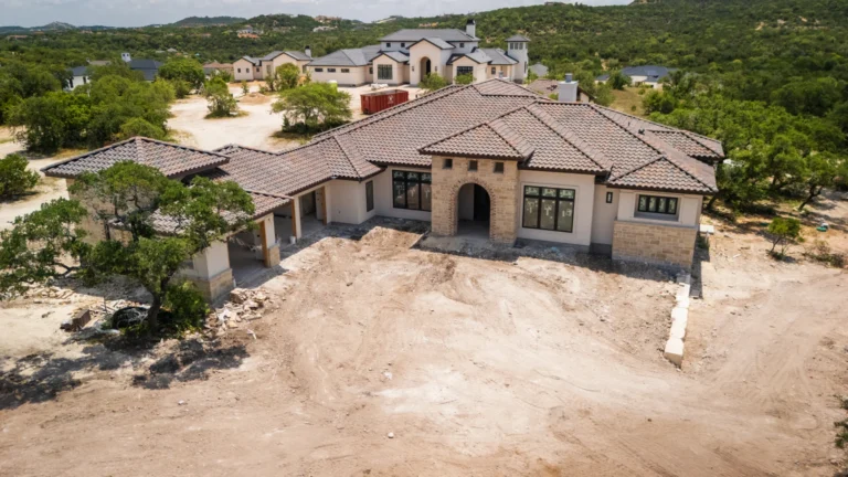 Aerial overhead photo of a custom modern tuscan estate by Genesis Custom Homes in Pecan Springs, Boerne, TX